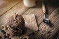 freshly baked chocolate chip cookies on rustic wooden table Royalty Free Stock Photo