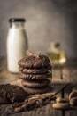 freshly baked chocolate chip cookies on rustic wooden table Royalty Free Stock Photo