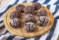 Freshly baked chocolate chip cookies on a wooden tray. Chocolate pastry Royalty Free Stock Photo