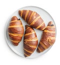 Freshly Baked Chocolate Croissants on plate Isolated Against White Background