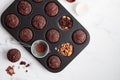 Freshly baked chocolate muffins in a baking pan Royalty Free Stock Photo