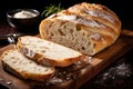 Freshly baked ciabatta bread on a cutting board, Ciabatta bread sliced on a board, AI Generated