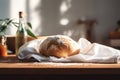 Freshly baked ciabatta bread on a white kitchen towel on a wooden table. Generative AI