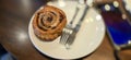 freshly baked Cinnamon rolls or cinnamon bun with raisins and vanilla also icing sugar ridiculously good Royalty Free Stock Photo