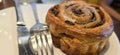 freshly baked Cinnamon rolls or cinnamon bun with raisins and vanilla also icing sugar ridiculously good Royalty Free Stock Photo