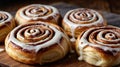 Delicious Fresh Baked Cinnamon Rolls Glazed with Sweet Cream Cheese Icing Royalty Free Stock Photo