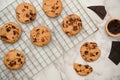 Freshly baked cookies or chocolate chip cookies on a wire cooling rack Royalty Free Stock Photo