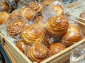 Freshly baked crispy bread buns on a counter or shelf in a store, close-up. Bakery products are sold in the market. Fresh bakery. Royalty Free Stock Photo