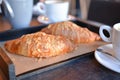 Freshly baked croissants with aromatic coffee Royalty Free Stock Photo