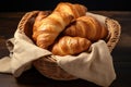 freshly baked croissants in a handwoven basket