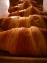 Freshly baked croissants on the table, a photo taken with a smartphone Royalty Free Stock Photo