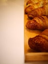 Freshly baked croissants on the table, a photo taken with a smartphone Royalty Free Stock Photo