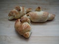 freshly baked croissants on wooden cutting board, top view. Royalty Free Stock Photo