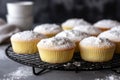 freshly baked cupcakes on a cooling rack Royalty Free Stock Photo