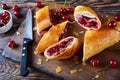 Cherry strudel on a wooden cutting board Royalty Free Stock Photo