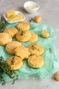 Freshly baked delicious english scones or cookies with cheese and thyme. Royalty Free Stock Photo