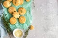 Freshly baked delicious english scones or cookies with cheese and thyme. Royalty Free Stock Photo