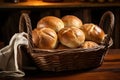 freshly baked dinner rolls in a rustic basket Royalty Free Stock Photo