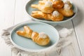 Freshly baked easter bunny made from yeast dough closeup on the plate. Horizontal Royalty Free Stock Photo