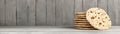 Freshly Baked Flatbreads Stacked on Wooden Surface Against Rustic Background Royalty Free Stock Photo