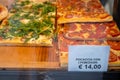 Freshly baked focaccia bread in a shop window in Genoa Royalty Free Stock Photo