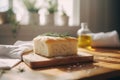 Freshly baked focaccia bread on a white kitchen towel on a wooden table. Generative AI Royalty Free Stock Photo