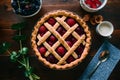 Freshly baked fruit pie showcased on the kitchen table