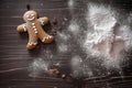 Freshly baked gingerbread man sitting on the kitchen table. Conceptual Christmas illustration. Generative AI