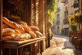 Freshly baked gourmet breads for sale in French bakery. Baguettes on early sunny morning in small town in France Royalty Free Stock Photo