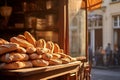 Freshly baked gourmet breads for sale in French bakery. Baguettes on early sunny morning in small town in France Royalty Free Stock Photo