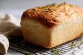 Freshly Baked Homemade Bread with Herbs on Cooling Rack. Royalty Free Stock Photo