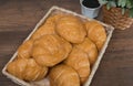 Freshly baked homemade croissants on wooden cutting board Royalty Free Stock Photo