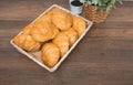 Freshly baked homemade croissants on wooden cutting board Royalty Free Stock Photo