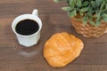 Freshly baked homemade croissants on wooden cutting board