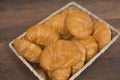 Freshly baked homemade croissants on wooden cutting board, top view Royalty Free Stock Photo