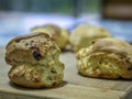 Freshly baked homemade date scone and other bread buns and rolls