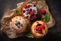 Freshly baked homemade muffins with berries, top view