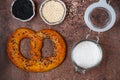 Freshly baked homemade Pretzel with black and white sesame and coarse sea salt Royalty Free Stock Photo