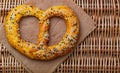 Freshly baked homemade Pretzel with black and white sesame seeds Royalty Free Stock Photo