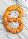 Freshly baked homemade Pretzel with black and white sesame seeds Royalty Free Stock Photo