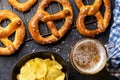 Freshly baked homemade pretzels and draft beer Royalty Free Stock Photo