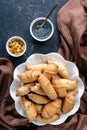 Freshly baked mini croissants with poppy seeds Royalty Free Stock Photo