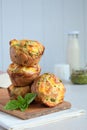 Freshly baked muffins with spinach, sweet potatoes and feta cheese on white background. Healthy food concept. Savory pastry Royalty Free Stock Photo