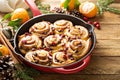 Freshly baked orange and cranberry cinnamon rolls