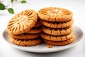 Freshly baked peanut butter cookies resting elegantly on a spotless white background Royalty Free Stock Photo