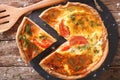 Freshly baked pie with feta cheese, tomatoes and herbs closeup. Royalty Free Stock Photo