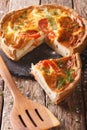 Freshly baked pie with feta cheese, tomatoes and herbs closeup. Royalty Free Stock Photo