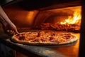 freshly baked pizza being removed from oven Royalty Free Stock Photo