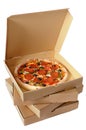 Pizza boxes stacked vertical, fresh pepperoni pizza Royalty Free Stock Photo