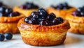 Freshly Baked Popovers with Blueberry, Perfect for National Blueberry Popover Day Royalty Free Stock Photo